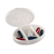 Pill box whit 3 compartments, specially marked for the morning pills, day pills and night pills. 