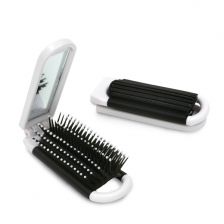 Foldable hairbrush with mirror